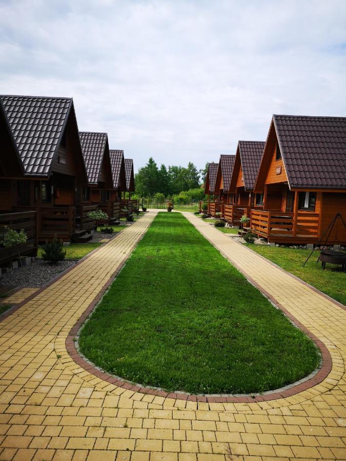 Domki Letniskowe "Przy Parku" Wisełka Esterno foto